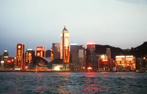 General view of the illuminated skyline at night time in Hong Kong