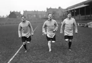 00464 Prints: A gentle training jog for feisty Nottingham Forest full-back Percy Barratt