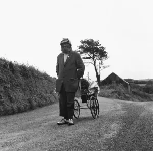 Pram Prints: Gentleman of the road George Gibb seen here with his battered pram tramping the roads