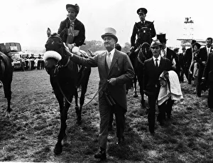 Geoff Lewis jockey on Mill Reef led by Paul Mellon owner after winning The Derby at Epsom