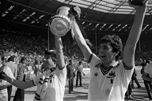 Geoff Pike and Ray Stewart of West Ham celebrate their win over Arsenal in the 1980 Cup