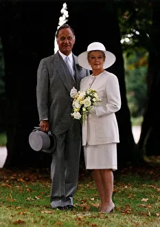 Geoffrey Palmer Actor poses with Judi Dench as guests at Lionels father