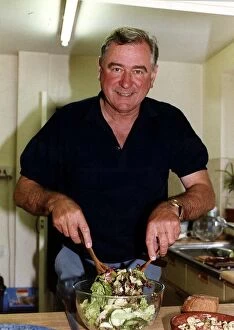 Images Dated 17th October 1990: George Baker actor preparing salad in his kitchen dbase A©Mirrorpix