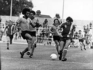 George Berry (left) moves in to challenge City striker Gary Stevens at Ninian Park - 10th