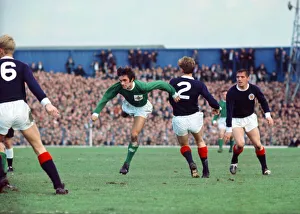 Jumping Prints: George Best in action for Northern Ireland against Scotland during the International