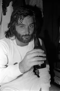Dressing Room Prints: George Best drinking beer after playing Dunstable Town FC August 1974