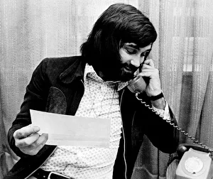 Sporting Legend Prints: George Best ex Manchester United footballer on phone 1980