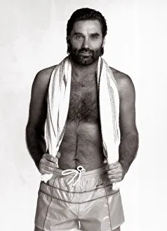 Sporting Legend Prints: George Best Football player - May 1986 at age 40 wearing just shorts