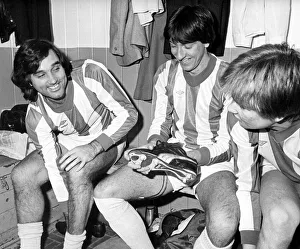 George Best gets changed into the No. 7 Nuneaton Borough shirt
