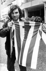 George Best gets the feel of the No. 7 Nuneaton Borough shirt
