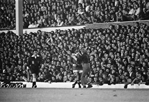 Arsenal Prints: George Best is greeted by a fan during the match. Manchester United v Arsenal
