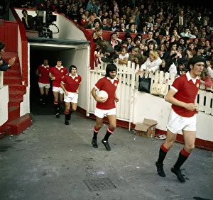 George Best of Manchester United walks onto the pitch at Old Trafford before their