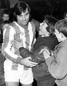 George Best meets the fans in the No. 7 Nuneaton Borough shirt