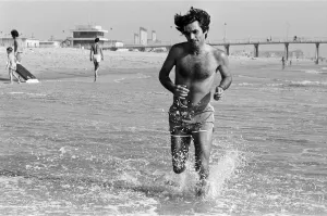 George Best putting in extra training running through the surf and sand at Hermosa Beach