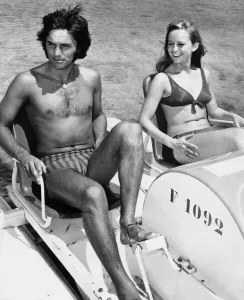 George Best sharing his champagne life style with actress Susan George in Palma Nova
