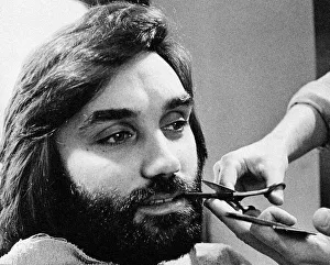 George Bests seen here having his beard trimmed at the barbers May 1974