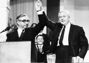 George Brown MP with Harold Wilson arms raised in air following Brown