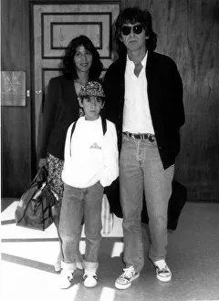 Core08 Prints: George Harrison formerly of the Beatles with family at London Airport August 1989