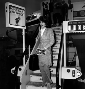George Harrison of the Beatles at Heathrow airport where he arrived from India where he