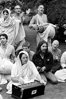 George Harrison of the Beatles pictured amongst the Buddhist American group