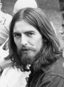 Long Prints: George Harrison of The Beatles pictured at Krishna Temple meeting in London