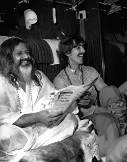 George Harrison of The Beatles, on the train going to Bangor in North Wales with