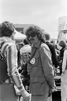 Sporting Prints: George Harrison at the British Grand Prix motor racing qualifying sessions at Silverstone