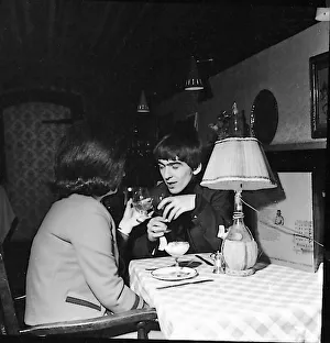 George Harrison out on a date with a friend of the family, London