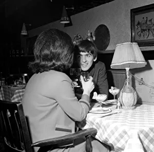 George Harrison out on a date with a friend of the family, London