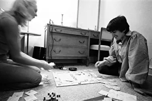 United States Of America Prints: George Harrison enjoys a game of Monopoly with singer songwriter Jackie de Shannon