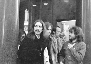 George Harrison leaves the Midland Hotel, New Street, Birmingham prior to appearing