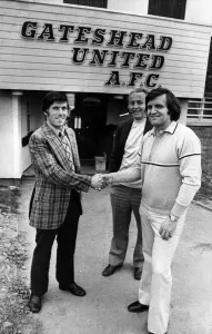 Shaking Hands Prints: George Herd bids goodbye to Gateshead United with a friendly handshake from fellow coach