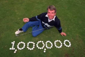 00200 Prints: George King the first millionaire in the Daily Mirror Scratch Card competition playing