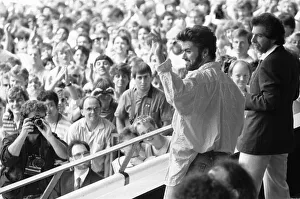 Audience Prints: George Michael in the audience during the opening of the Live Aid Concert at Wembley