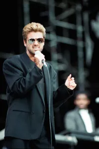 George Michael performing on stage at the Nelson Mandela 70th Birthday Tribute concert