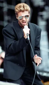 George Michael performing on stage at the Nelson Mandela 70th Birthday Tribute concert