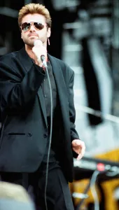 George Michael performing on stage at the Nelson Mandela 70th Birthday Tribute concert
