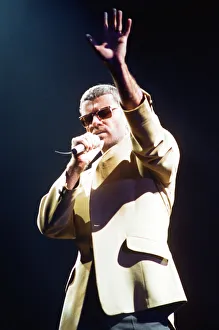 George Michael performing on stage at the Wembley Arena during his Cover to Cover tour