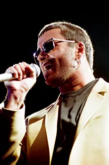 George Michael performing on stage at the Wembley Arena during his Cover to Cover tour