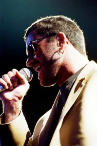 George Michael performing on stage at the Wembley Arena during his Cover to Cover tour