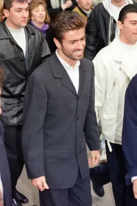 Legal Prints: George Michael pictured outside the Law Courts where he was giving evidence in his court