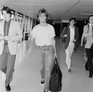 Photographer Prints: George Michael, singer from Wham ! arrives at Heathrow Airport from Paris today