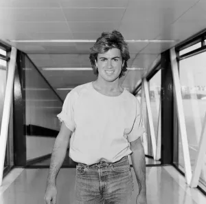 Entertainmnent Prints: George Michael, singer from Wham ! arrives at Heathrow Airport from Paris today