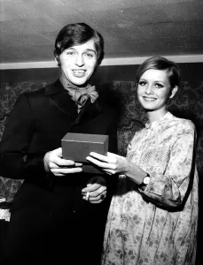 Georgie Fame is presented with award for personality of the year by model Twiggy