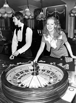 Pastime Prints: Geraldine Hodson spins the wheel at the roulette table in the newly opened Casino Royal