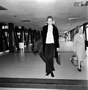 00034 Prints: German actress Marly Hass today left Heathrow Airport for Hollywood where she lives