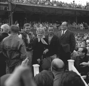 German driver Wolfgang Von Trips on the podium with Mrs Ferrari