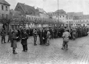 01462 Prints: German male civilians of military age in the town of Uerdingen are assembled by Military