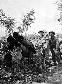 Italy Prints: German Moaning Minnie (Nebelwerfer) inspected by Canadian officer