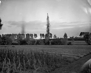 00118 Prints: German shells bursting in the great reservoirs at Waelhem close to Antwerp
